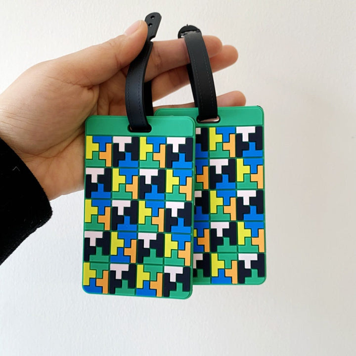 Lebhafter Puzzle-Muster Kofferanhänger Skanto