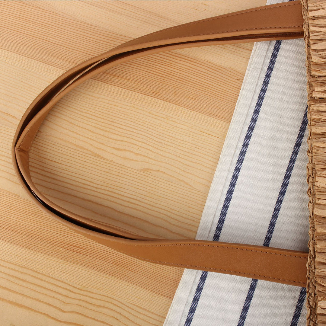 Strandtasche aus handgewebtem Naturmaterial mit Fransen-Detail Skanto