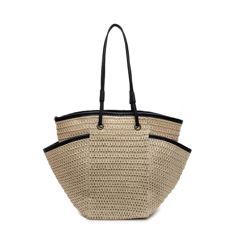 Geräumige Strohtasche mit eleganten Lederdetails Skanto