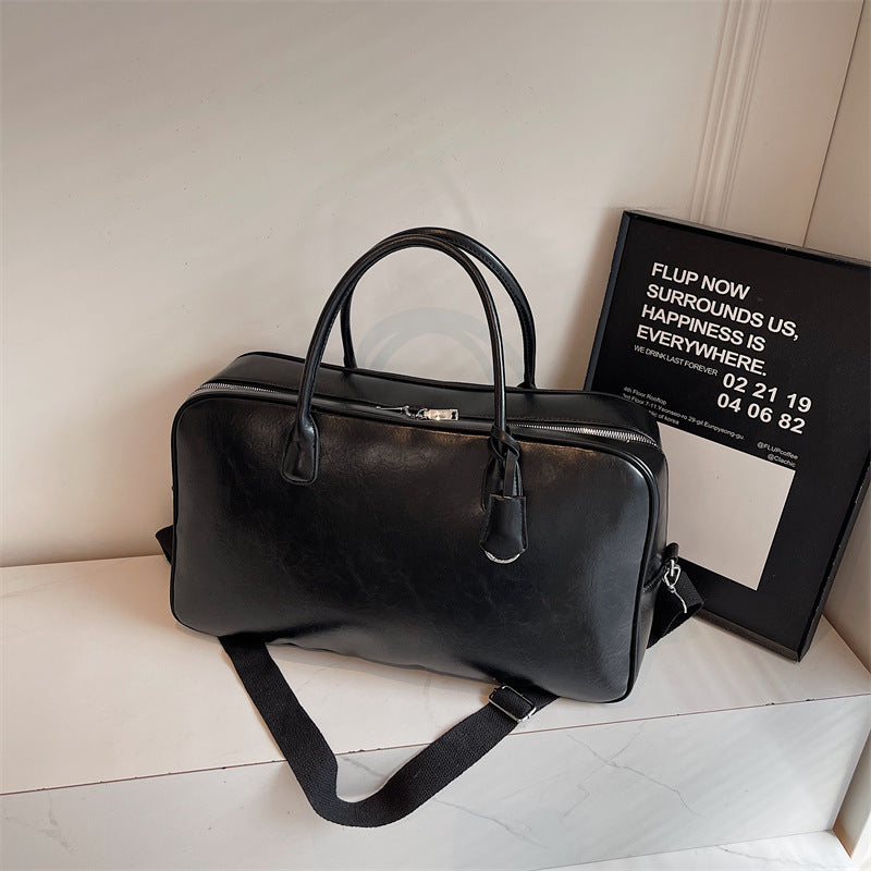 Elegante und geräumige Reisetasche aus Kunstleder Skanto