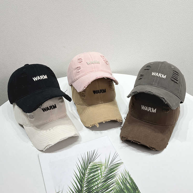 Damen Baumwoll-Cap im Used-Look mit gestickter Botschaft Skanto