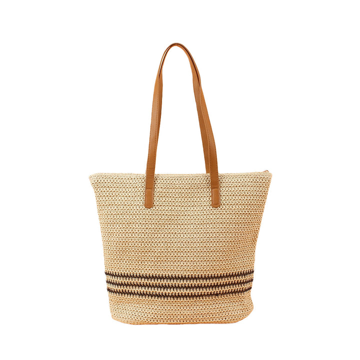 Trendige Strandtasche aus geflochtenem Raffia mit eleganten Ledergriffen Skanto
