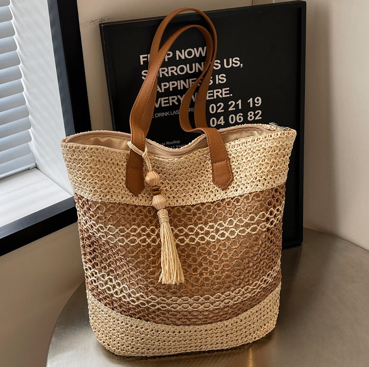 Shopper aus geflochtenem Naturmaterial mit verspieltem Quasten-Detail Skanto