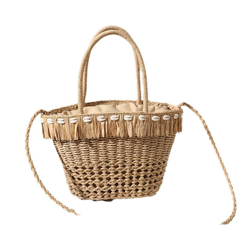 Geflochtene Strohtasche mit dekorativer Quaste Skanto