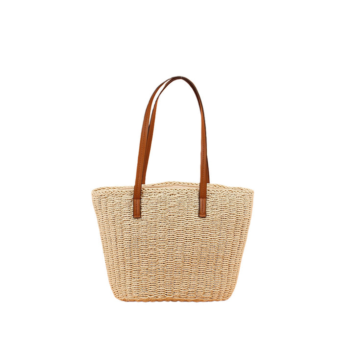 Handtasche aus handgeflochtenem Naturmaterial mit robusten Ledergriffen Skanto