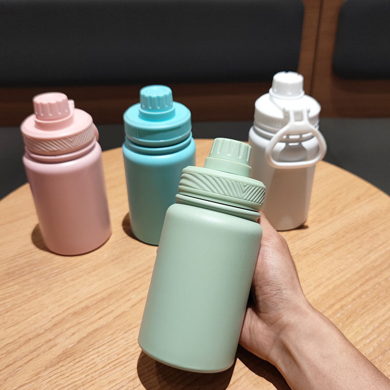 Skanto Isolierte Trinkflasche für Frauen mit ergonomischem Griff Skanto