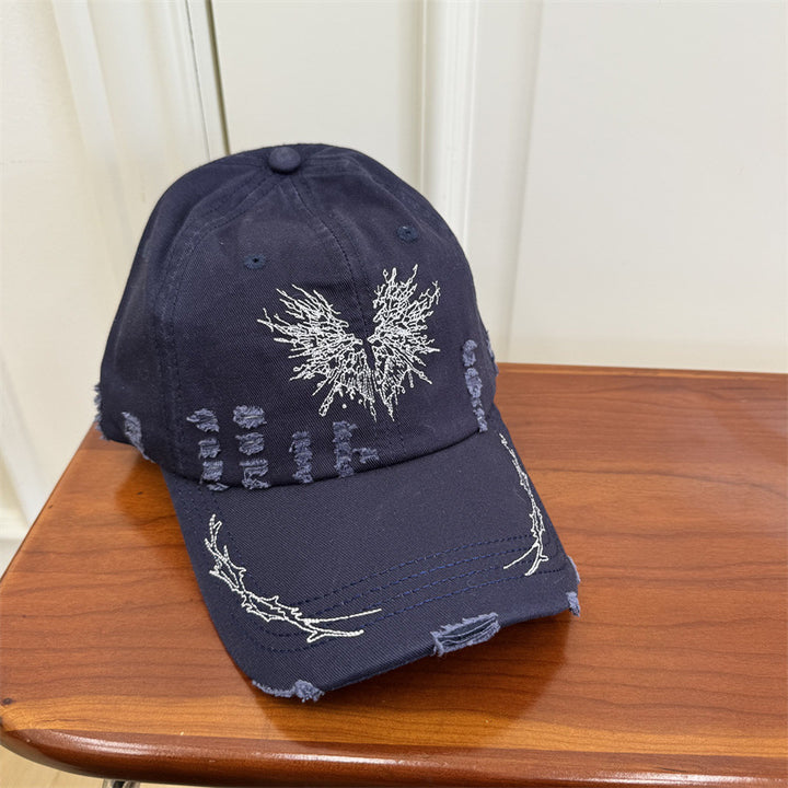 Damen Baseball Cap mit Grafik im Used-Look Skanto