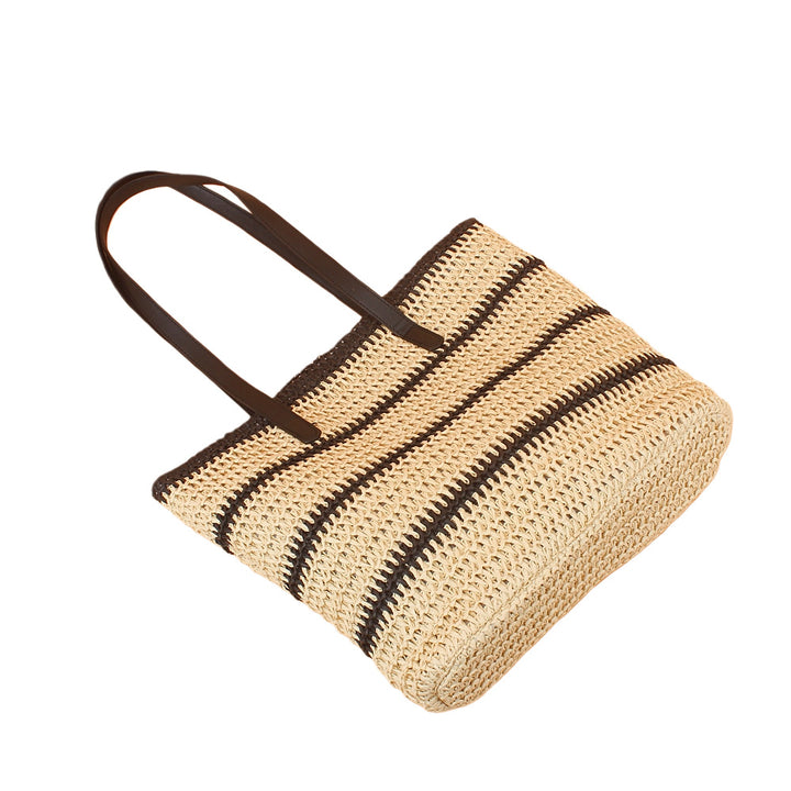 Trendige Strandtasche aus geflochtenem Raffia mit eleganten Ledergriffen Skanto