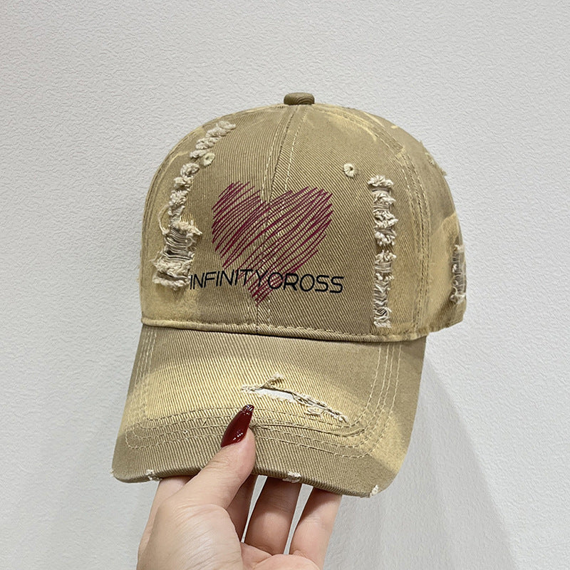 Damen Baseballkappe im Used-Look mit Herzstickerei, Skanto