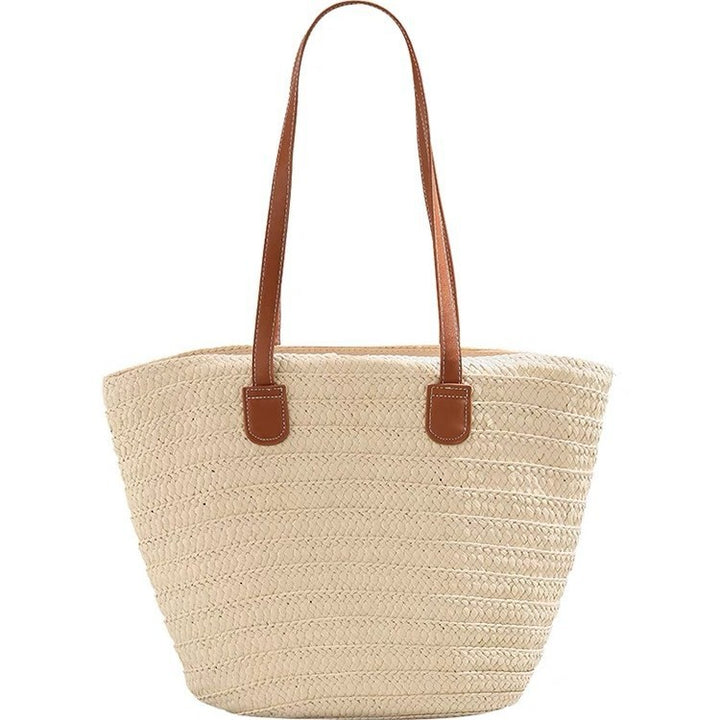 Stylische Strandtasche aus geflochtenem Naturmaterial mit Ledergriffen Skanto