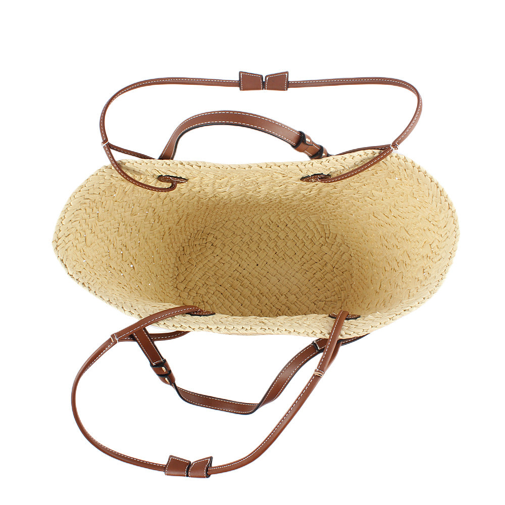 Elegante gewebte Handtasche aus Naturmaterial mit robusten Ledergriffen Skanto