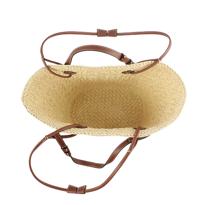 Elegante gewebte Handtasche aus Naturmaterial mit robusten Ledergriffen Skanto