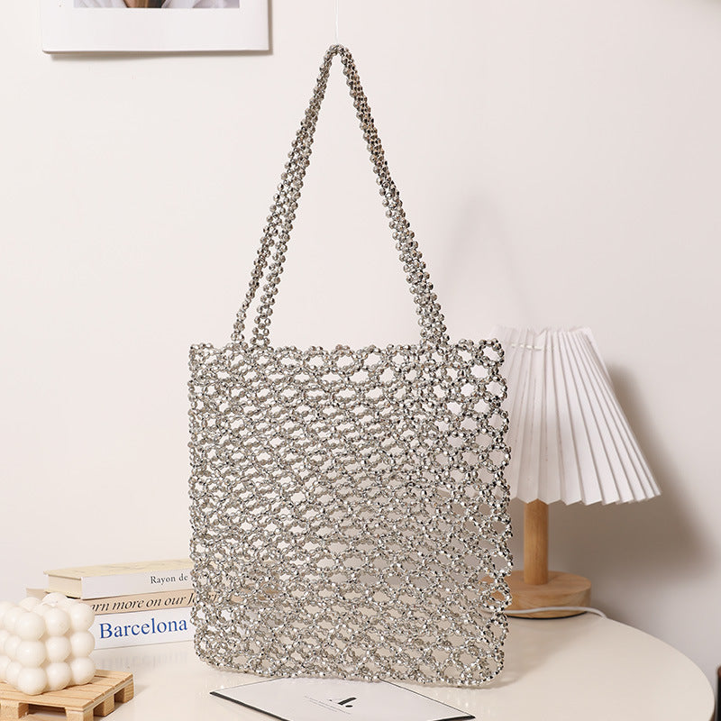 Glitzernde Netztasche aus geflochtenem Material Skanto