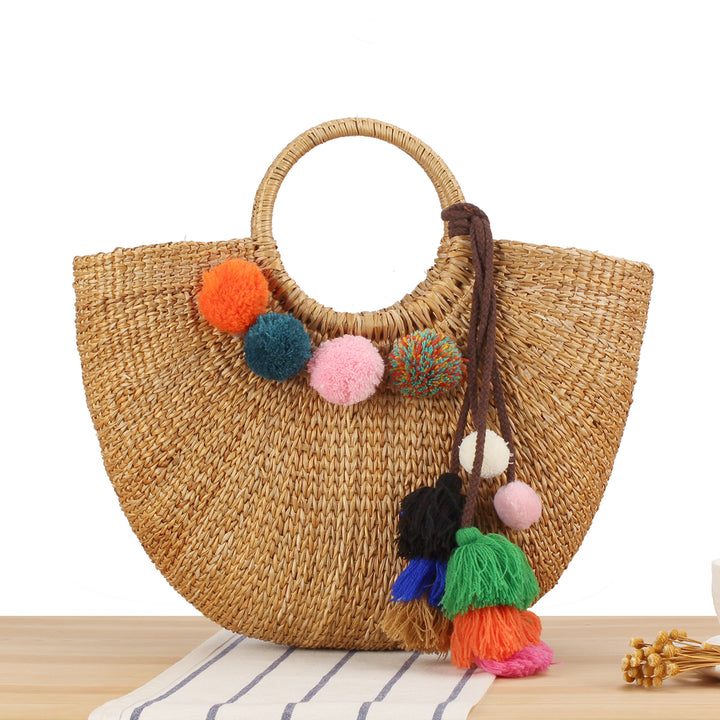 Strohtasche mit bunten Quasten und Pompons Skanto