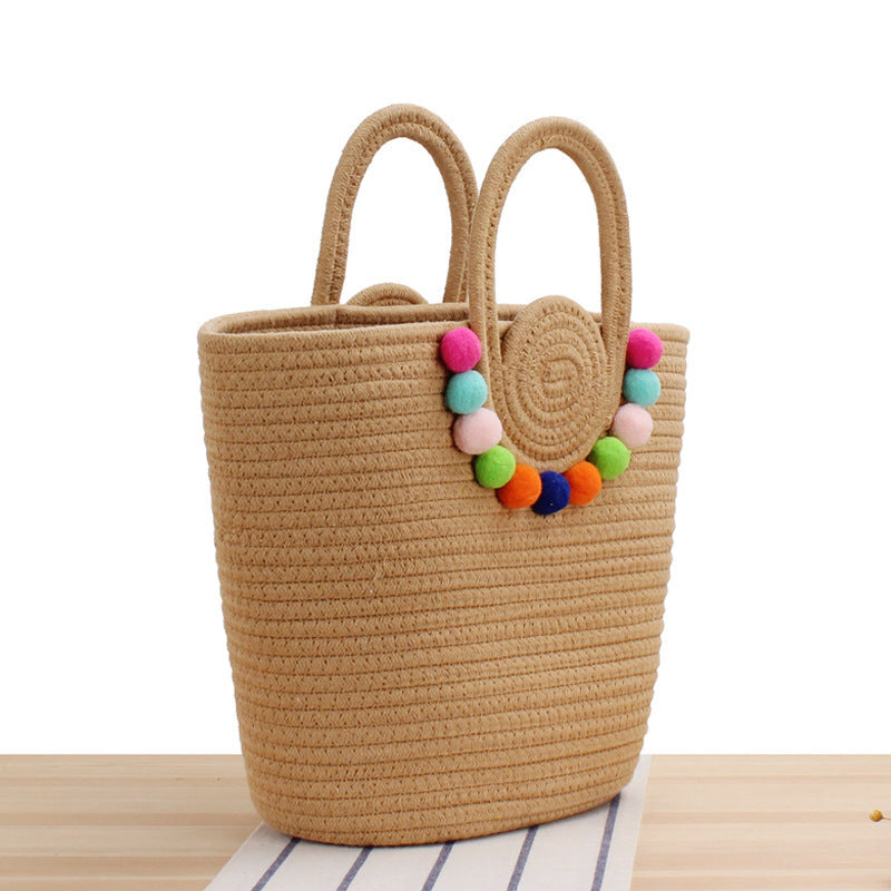Moderne Handtasche mit verspielten Pompon-Verzierungen Skanto