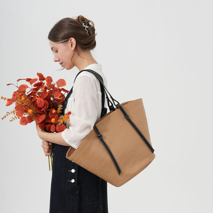 Elegante Strandtasche aus gewebtem Naturmaterial mit Lederdetails Skanto