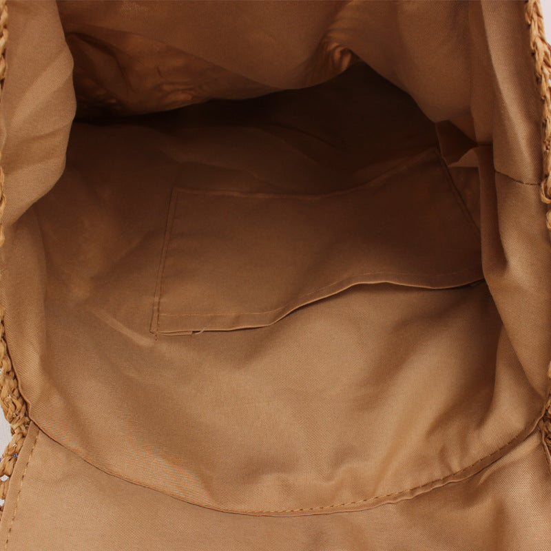 Rucksack aus Natur-Raffia mit Lederdetails Skanto