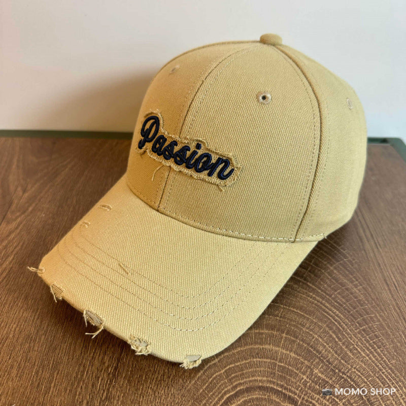 Damen Baseballkappe aus Baumwolle im Used-Look mit gesticktem Zitat Skanto