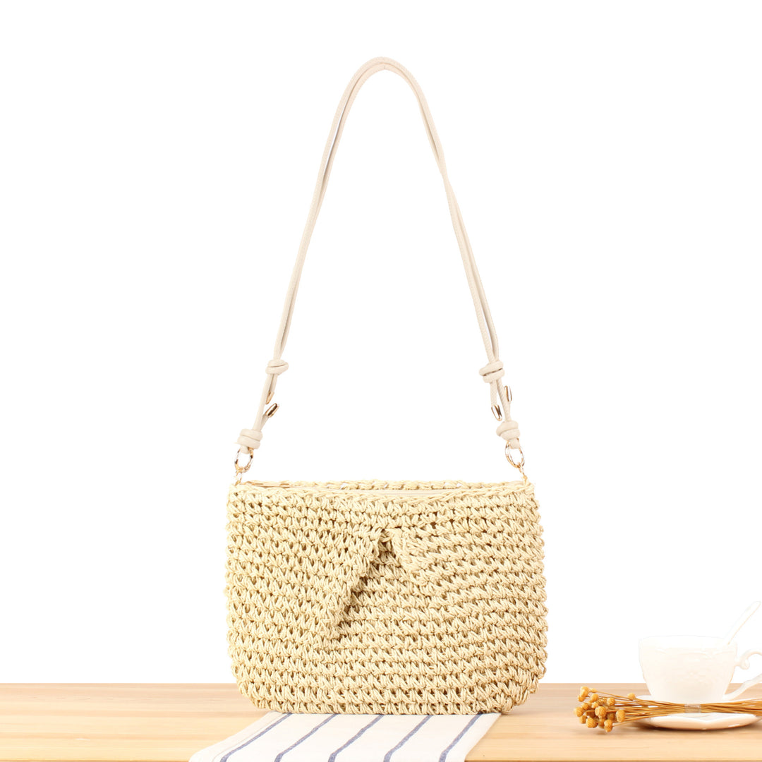 Handtasche aus geflochtenem Naturmaterial mit elegantem Knopfverschluss Skanto