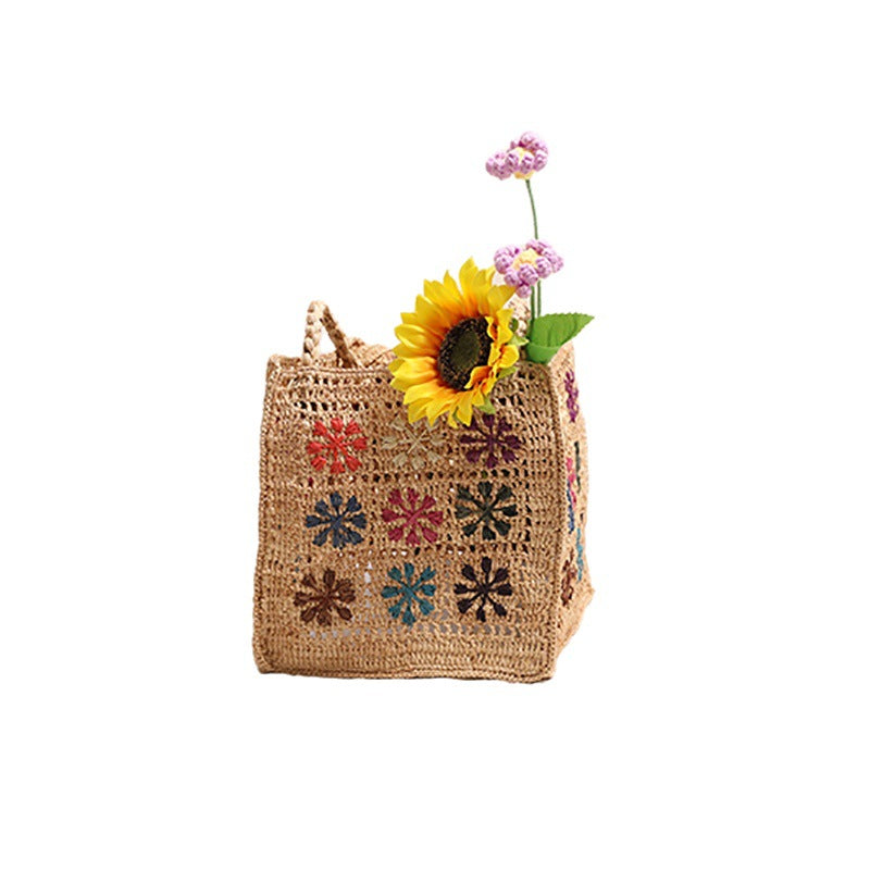 Handgefertigte Strohtasche mit farbigem Stickdesign Skanto