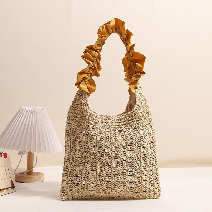 Elegante Handtasche mit gerafftem Ziergriff Skanto
