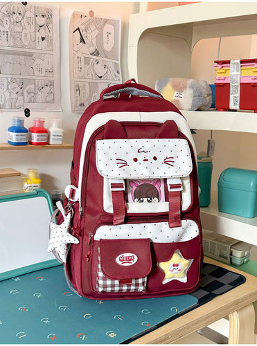 Schulrucksack mit mehreren Fächern und niedlichem Charakter-Motiv