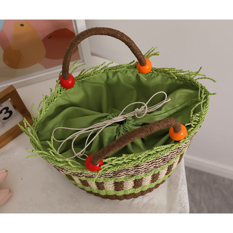 Handgemachte Korbtasche mit fröhlichem Gartenmotiv Skanto