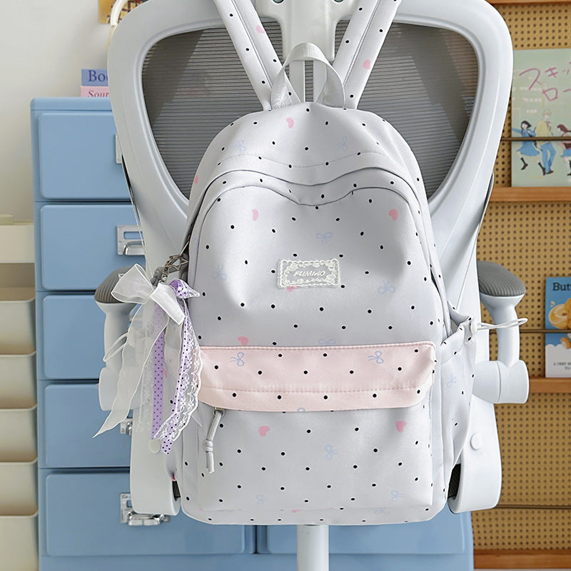 Charmanter gepunkteter Schulrucksack für Kinder