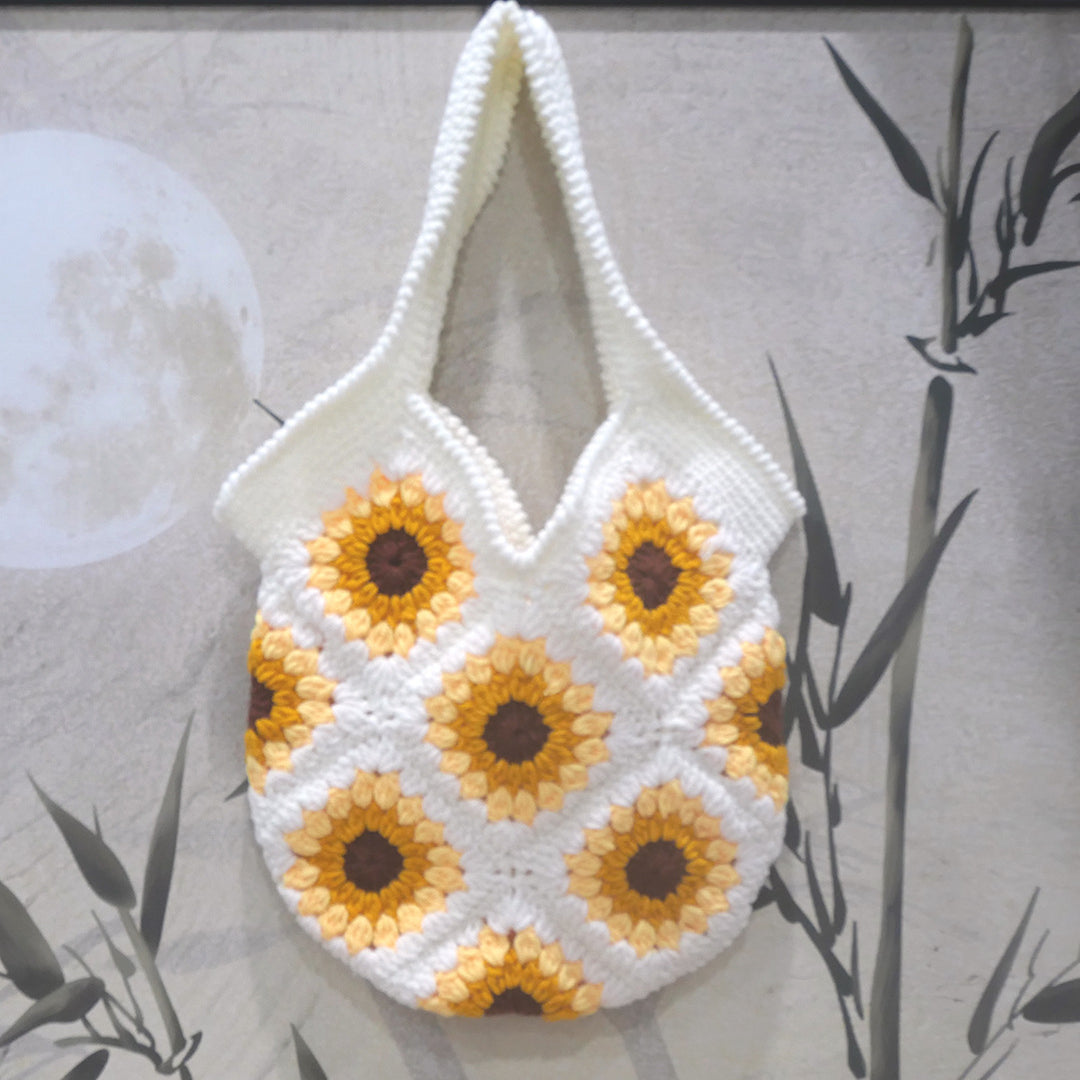 Handgefertigte Makramee-Umhängetasche mit Blumenmuster Skanto