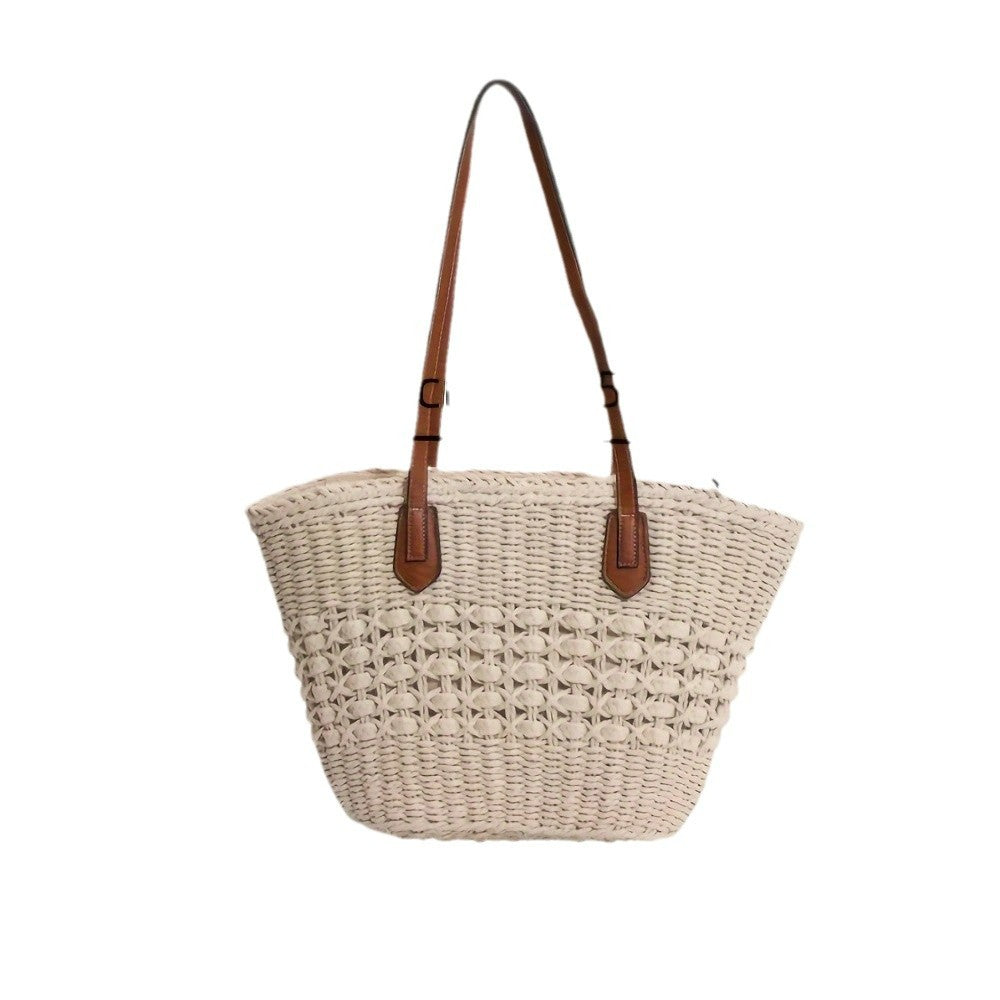 Handtasche mit geflochtenem Design und Ledergriff Skanto