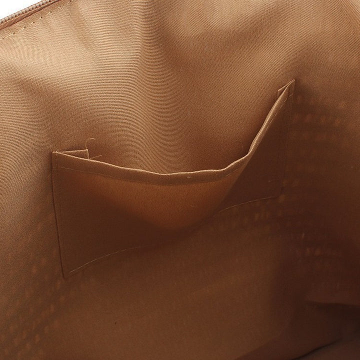 Geräumige Clutch aus geflochtenem Naturmaterial mit dekorativer Quaste Skanto