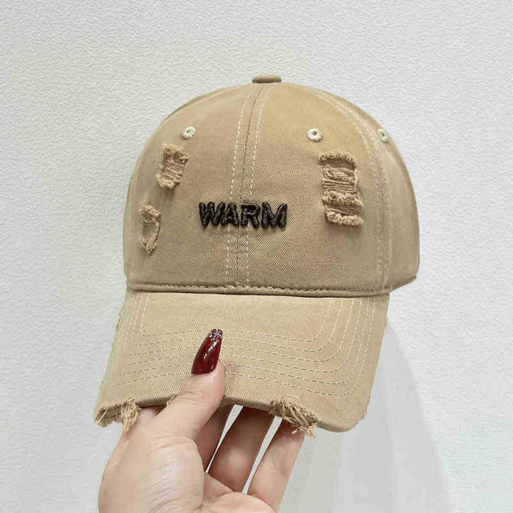 Damen Baumwoll-Cap im Used-Look mit gestickter Botschaft Skanto
