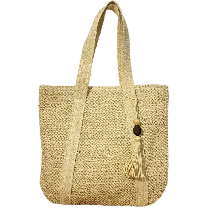 Handtasche aus natürlichem, handgewebtem Stroh mit eleganten Fransen Skanto