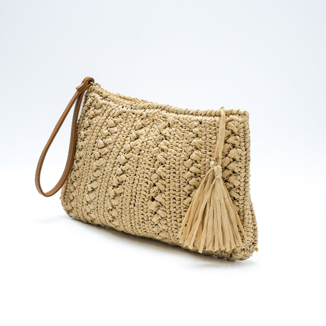 Handtasche aus geflochtenem Naturmaterial mit Quaste Skanto