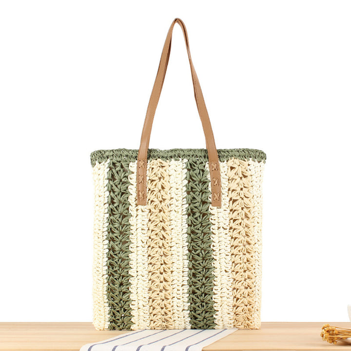 Strandtasche aus gewebtem Naturmaterial mit stabilen Ledergriffen Skanto