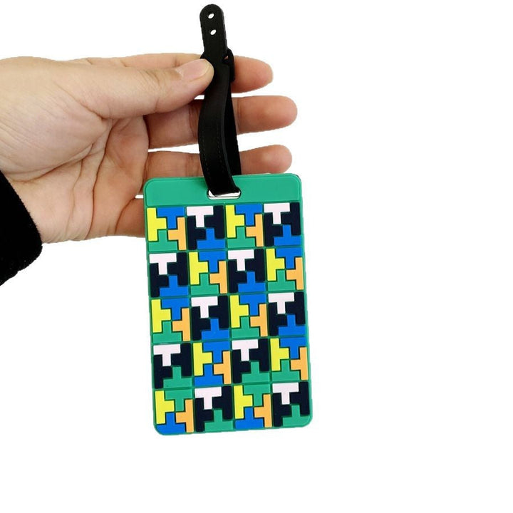 Lebhafter Puzzle-Muster Kofferanhänger Skanto