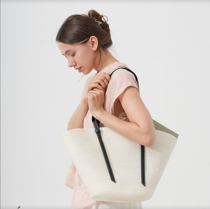 Elegante Strandtasche aus gewebtem Naturmaterial mit Lederdetails Skanto