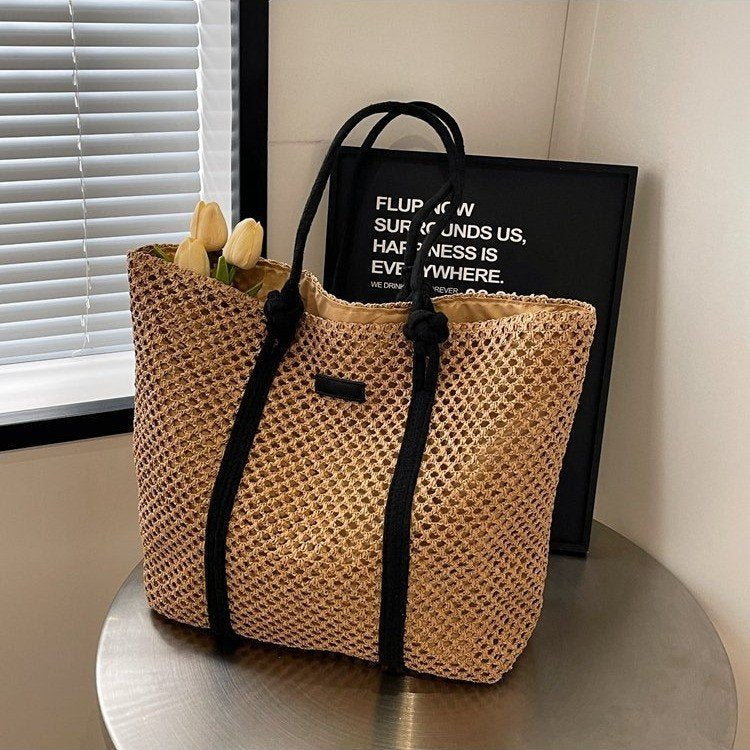 Strandtasche aus handgewebtem Naturmaterial mit stabilen Griffen Skanto