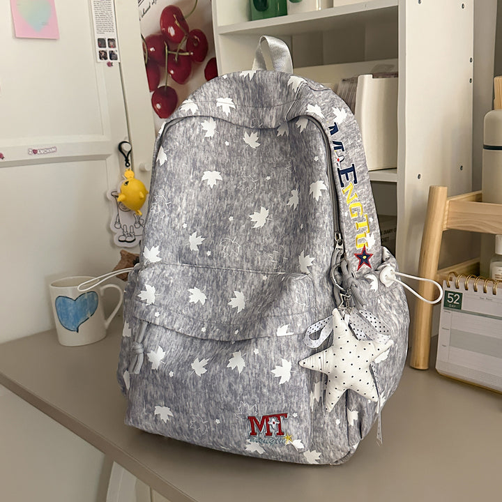 Moderner Schulrucksack mit Blattmuster