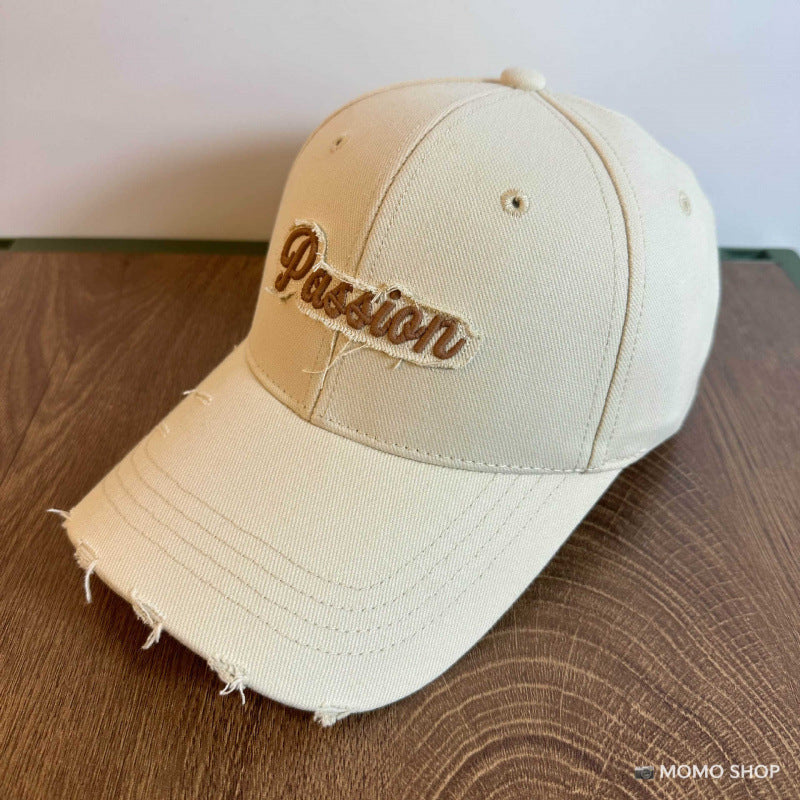 Damen Baseballkappe aus Baumwolle im Used-Look mit gesticktem Zitat Skanto