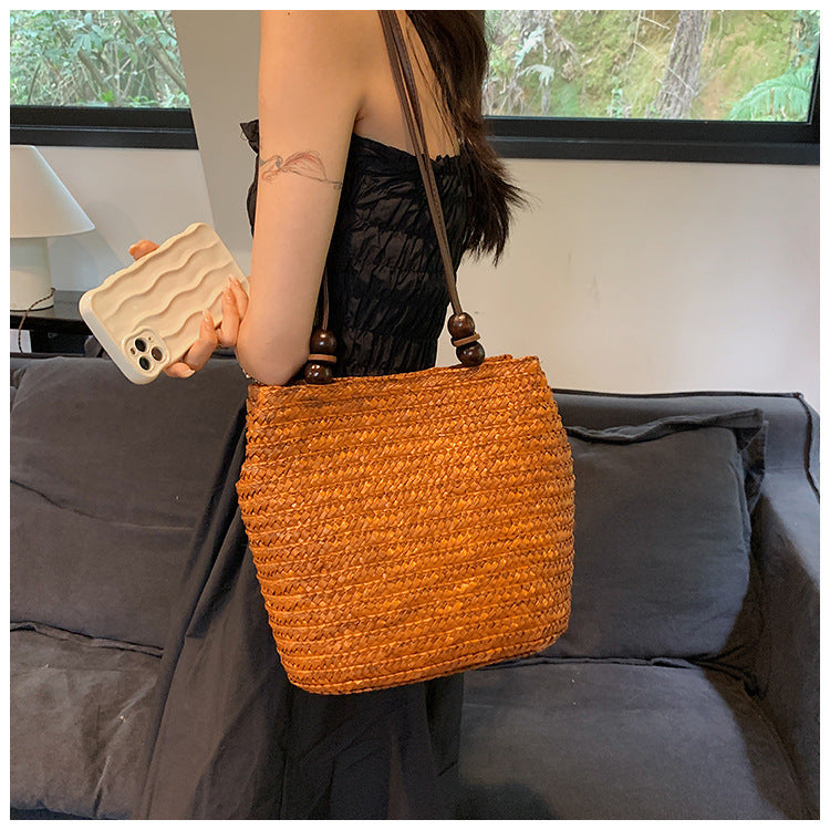 Elegante Korbtasche mit Lederdetails Skanto
