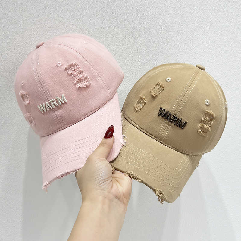 Damen Baumwoll-Cap im Used-Look mit gestickter Botschaft Skanto