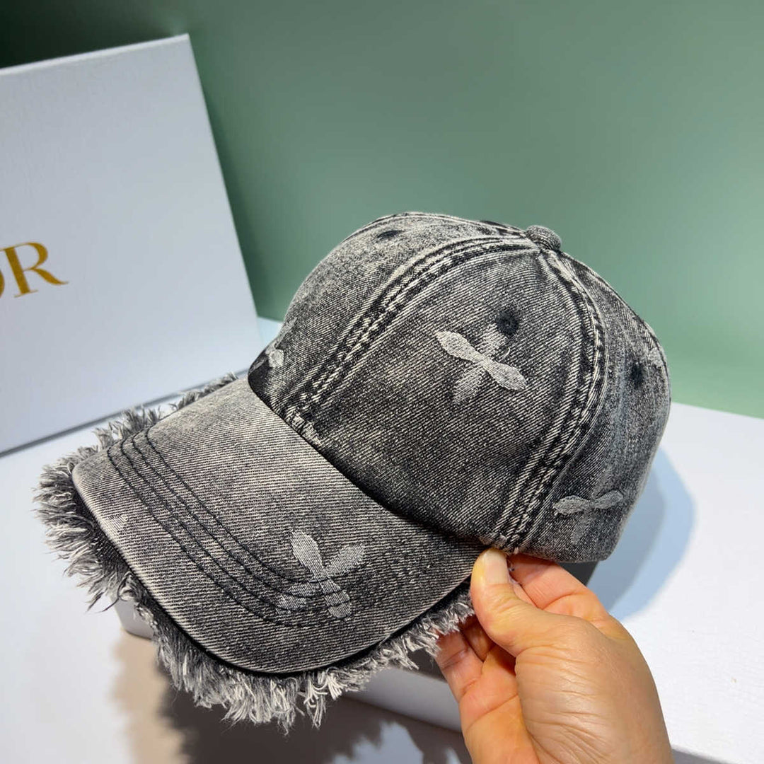 Unisex Used-Look Jeans-Kappe mit Fransen Skanto