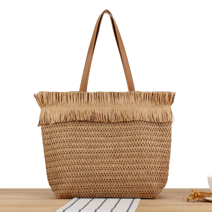 Strandtasche aus handgewebtem Naturmaterial mit Fransen-Detail Skanto