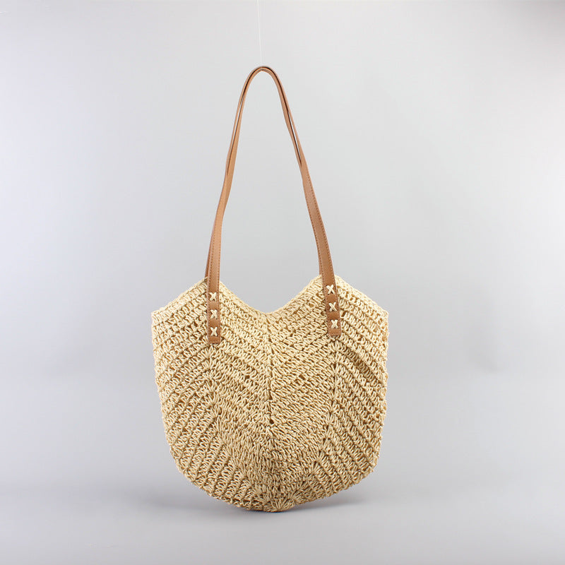 Freizeittaschen aus handgewebtem Raffia mit breiten Ledergriffen Skanto