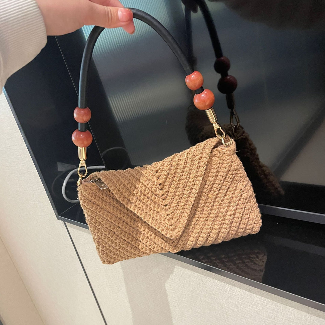 Handtasche mit stilvollen eingesetzten Griffen Skanto