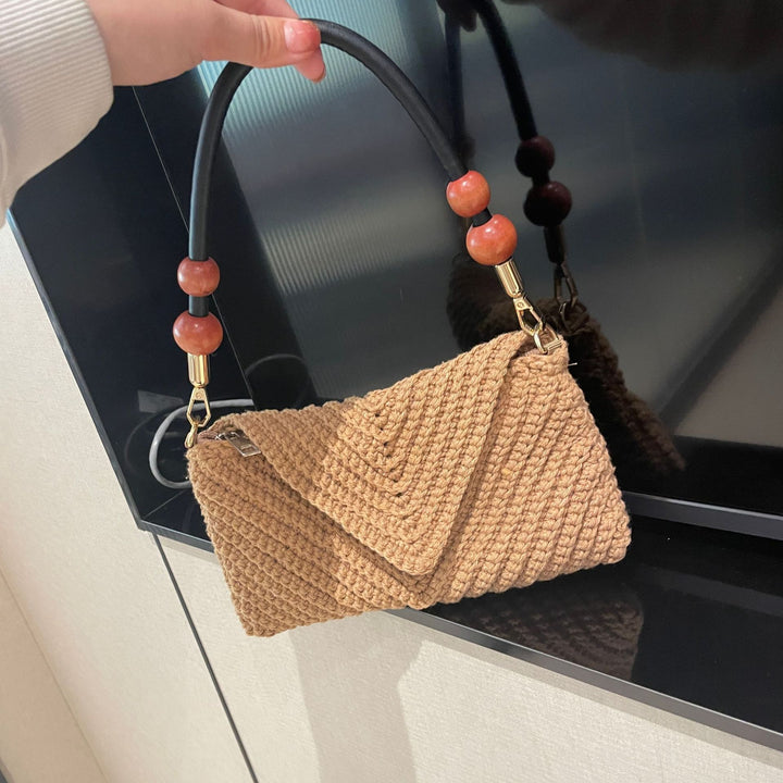 Handtasche mit stilvollen eingesetzten Griffen Skanto