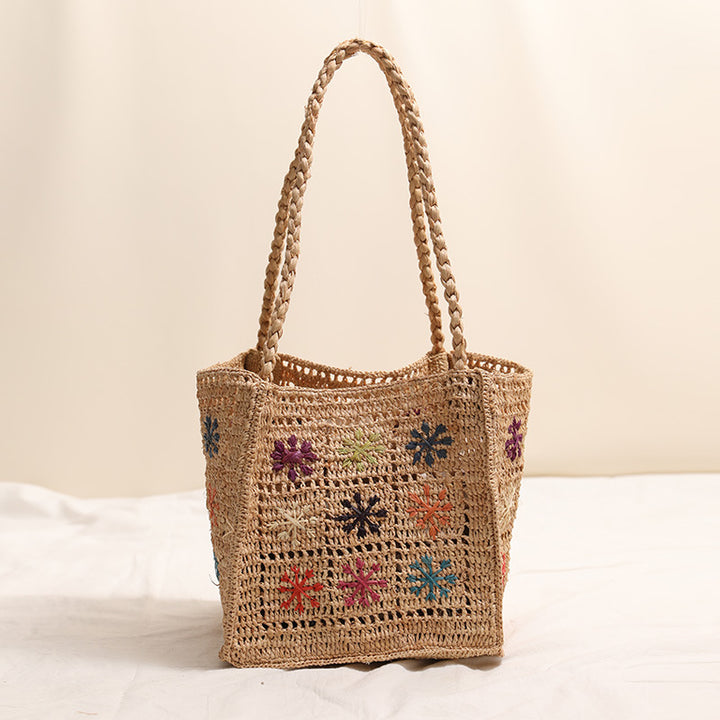 Handgefertigte Strohtasche mit farbigem Stickdesign Skanto