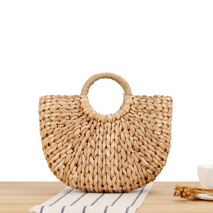 Handtasche aus handgefertigtem Naturmaterial mit elegantem Rundgriff Skanto