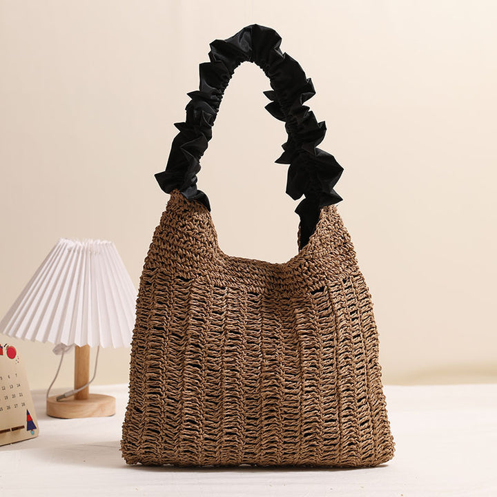 Elegante Handtasche mit gerafftem Ziergriff Skanto